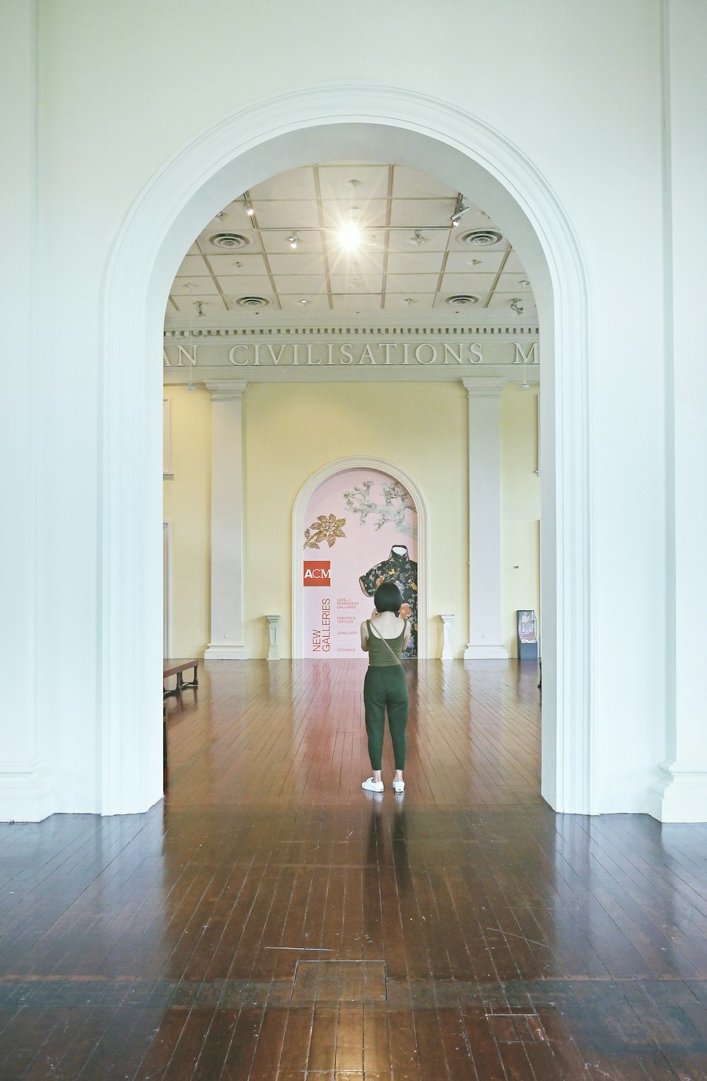 man and woman walking on hallway