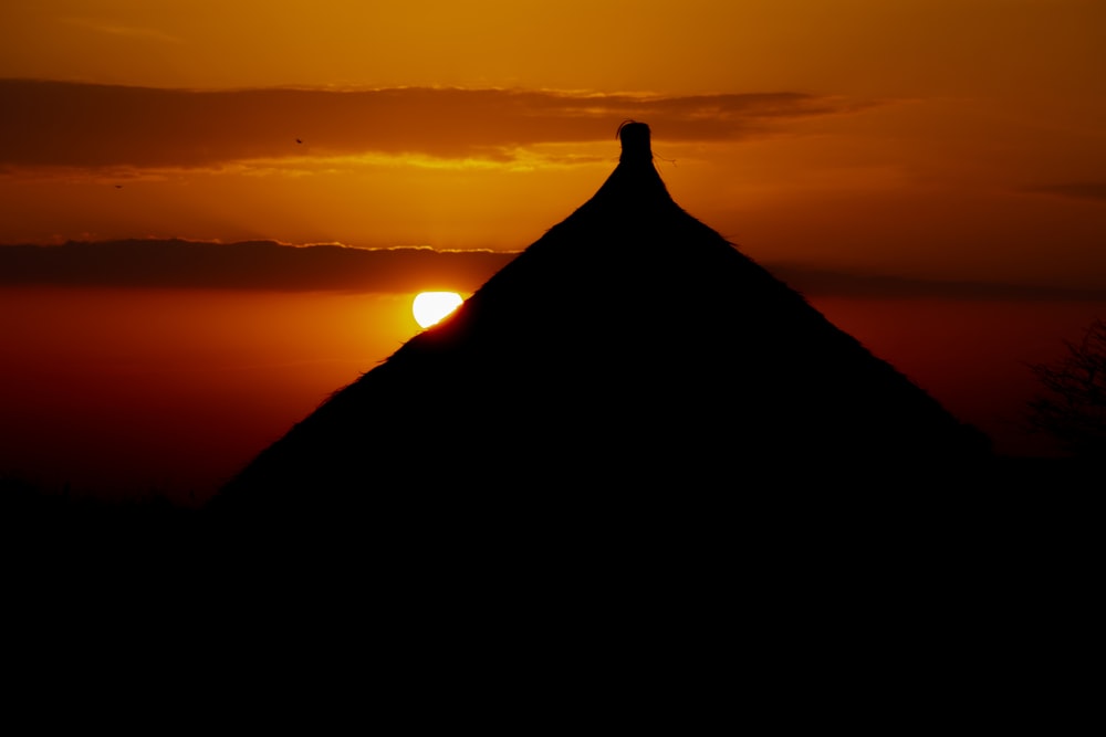 silhouette of mountain during sunset