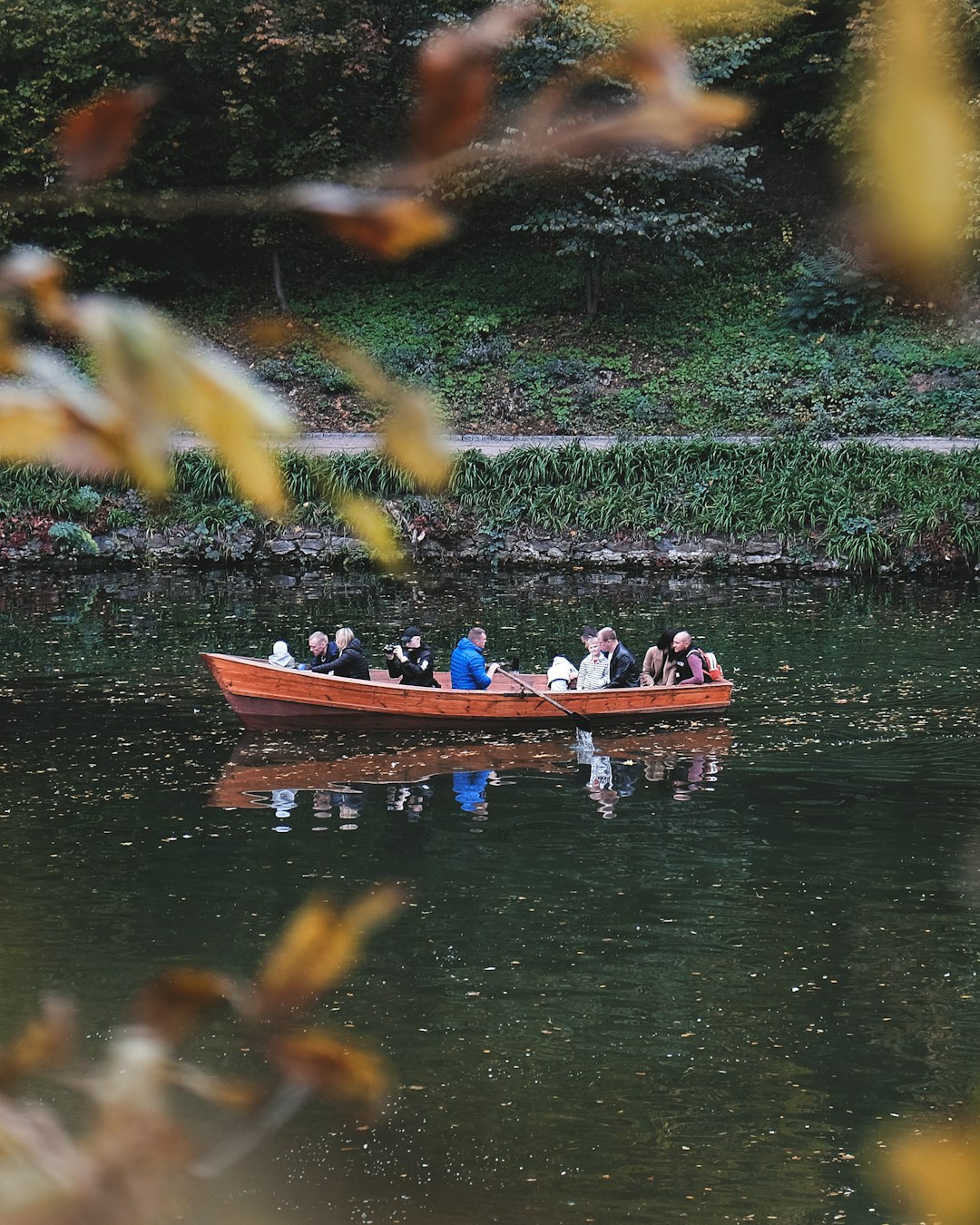 people riding on boat on water