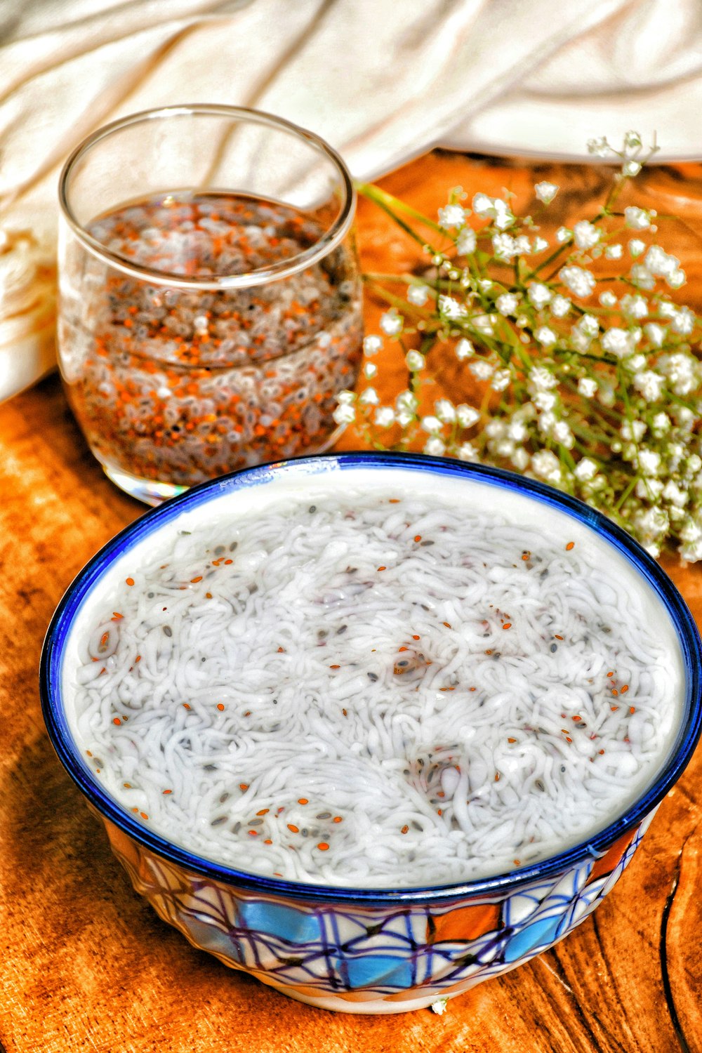 white rice on blue and white ceramic bowl