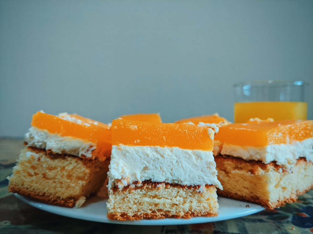 sliced bread with cheese on white ceramic plate