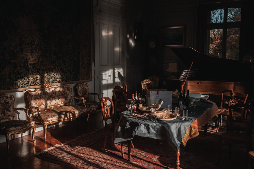 brown wooden table with chairs near brown wooden door