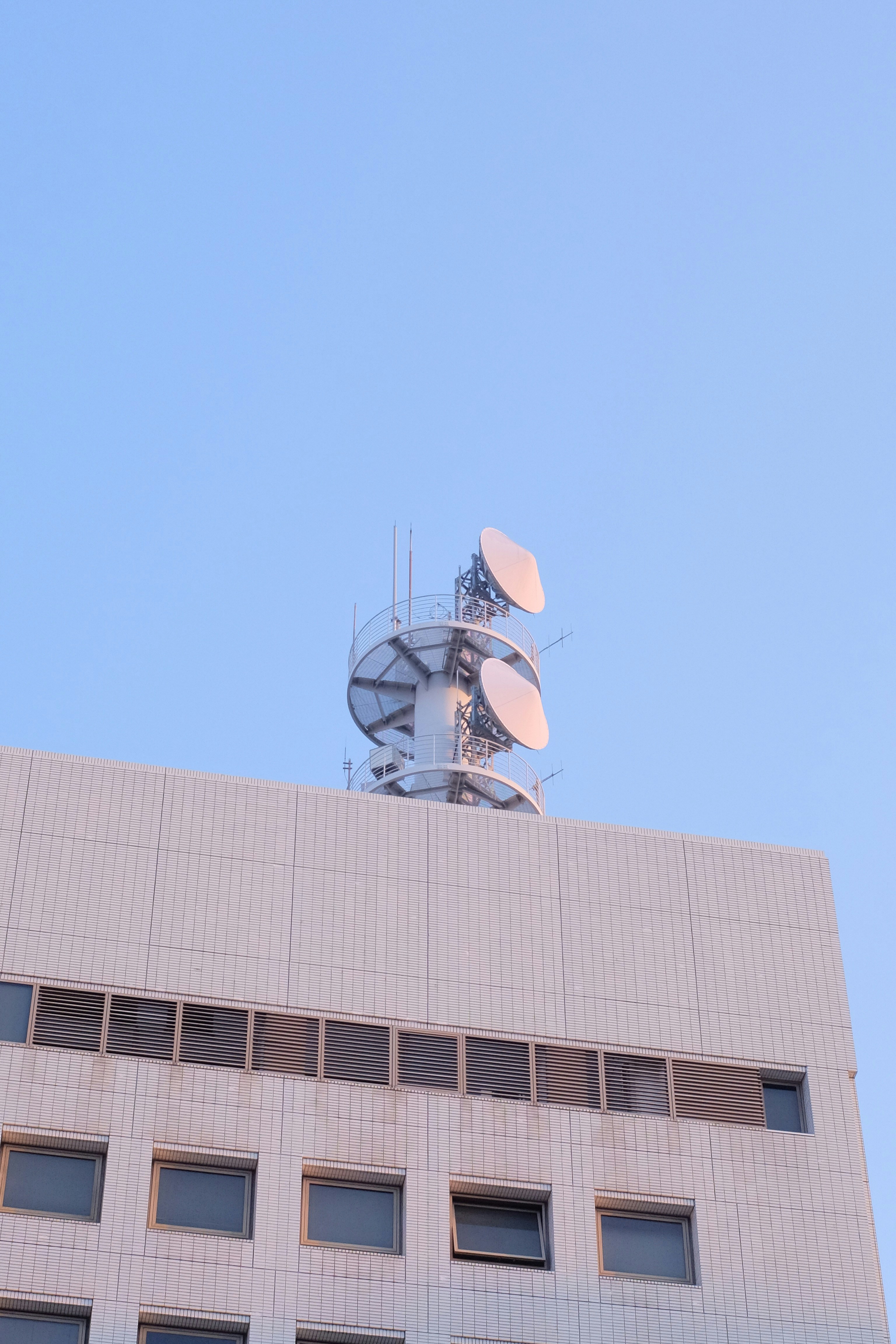 brown concrete building under blue sky during daytime