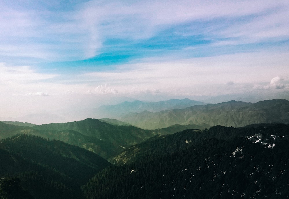 green mountains under blue sky during daytime