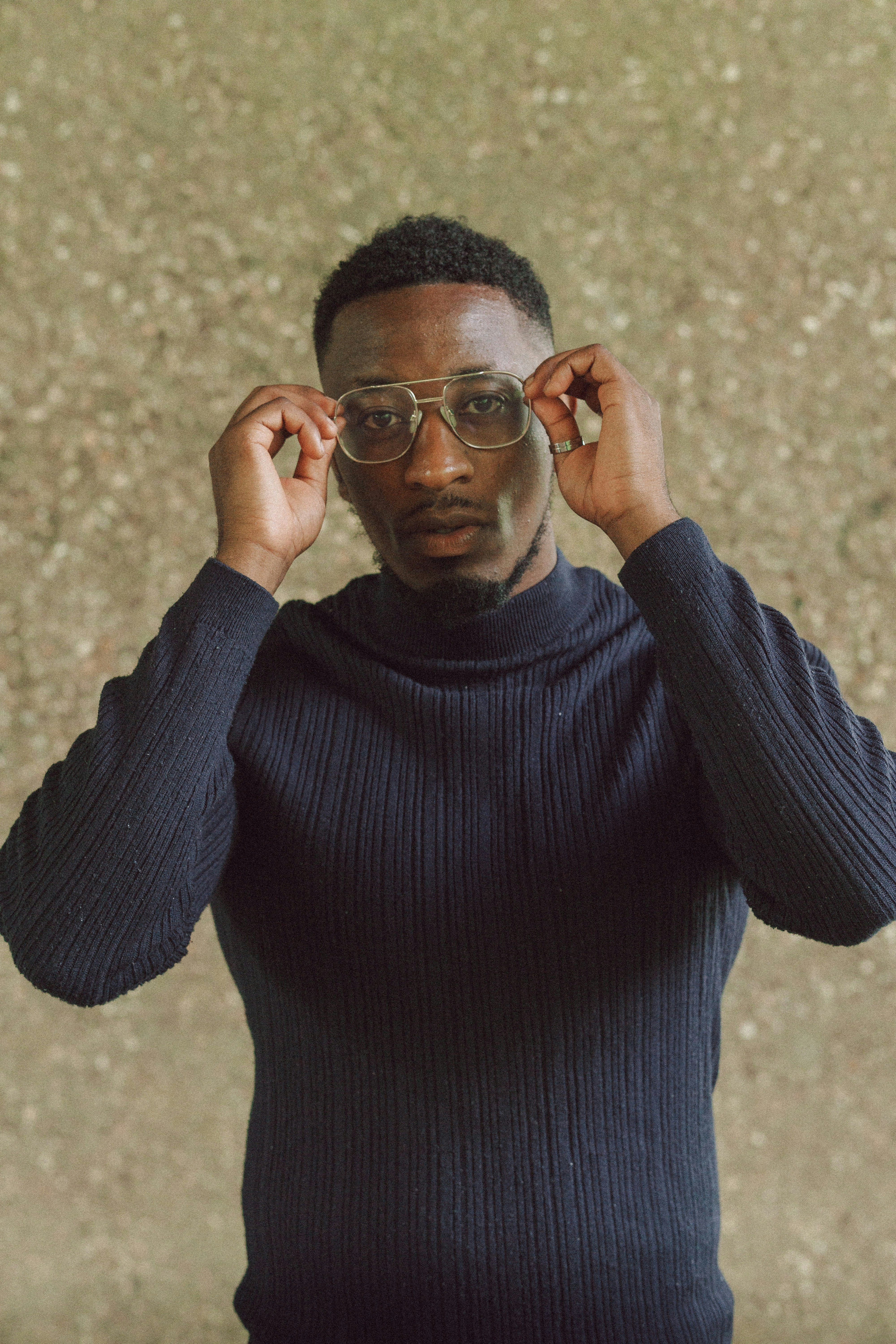 man wearing black turtleneck