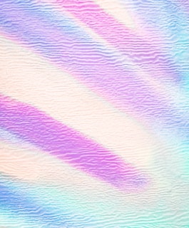 Soft, wavy textures in pastel hues create a calming and abstract composition, featuring gentle ripples across the surface.