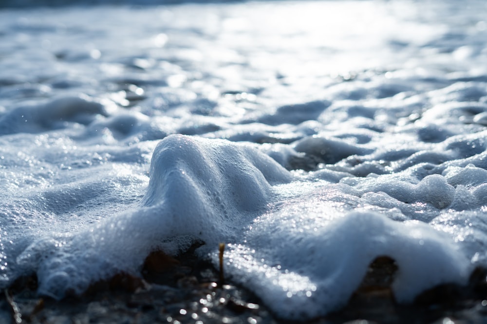 white snow on black soil