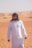 man in white long sleeve shirt wearing black sunglasses