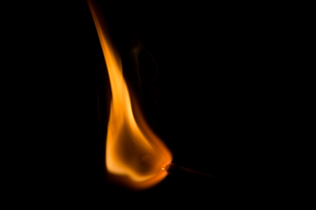  fire in black background with black background match box