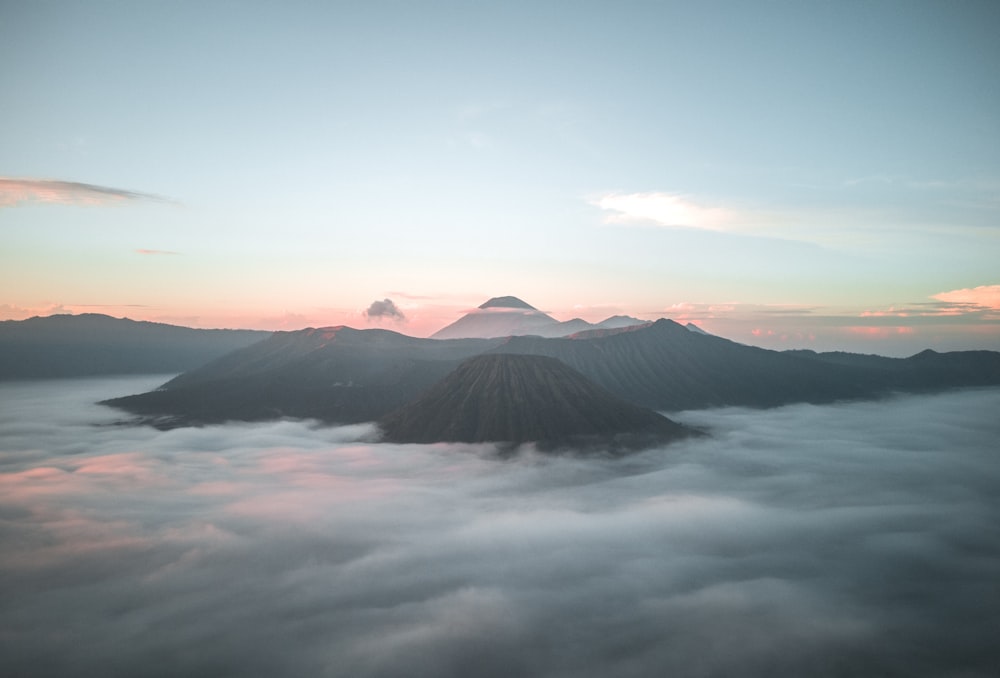 mountains and clouds during daytime