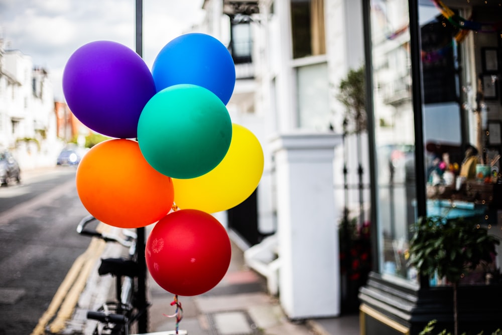 blue yellow red and pink balloons