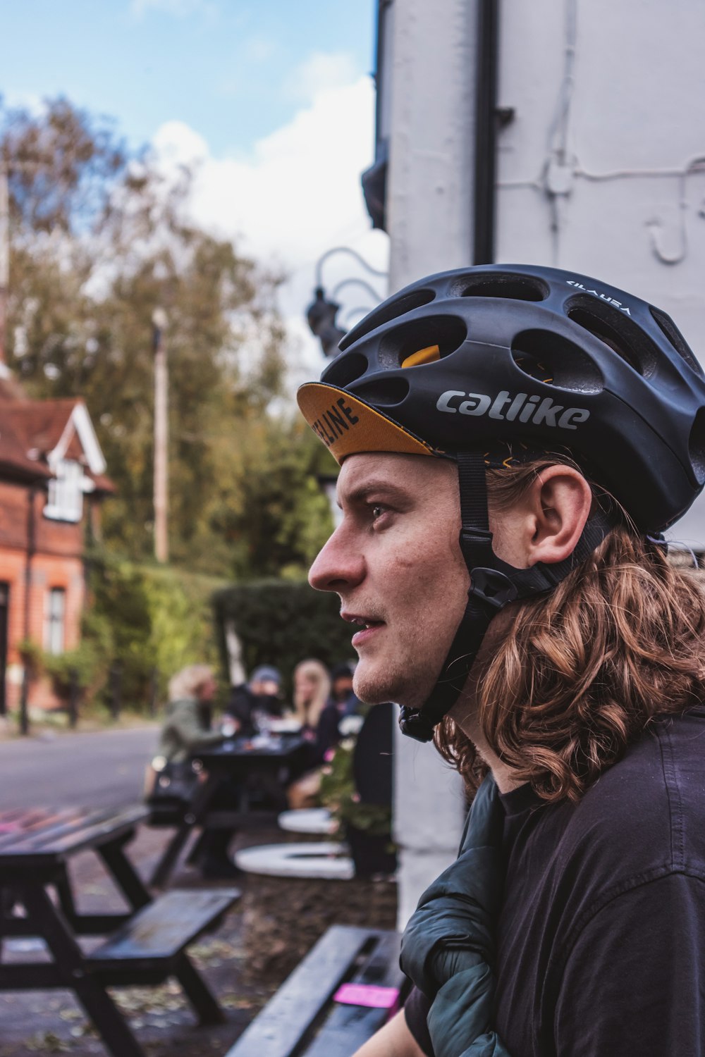 woman in black shirt wearing black helmet