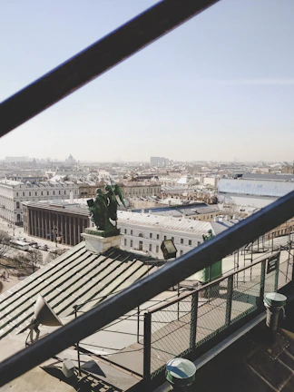 A panoramic view of a commercial building with a newly completed roof.