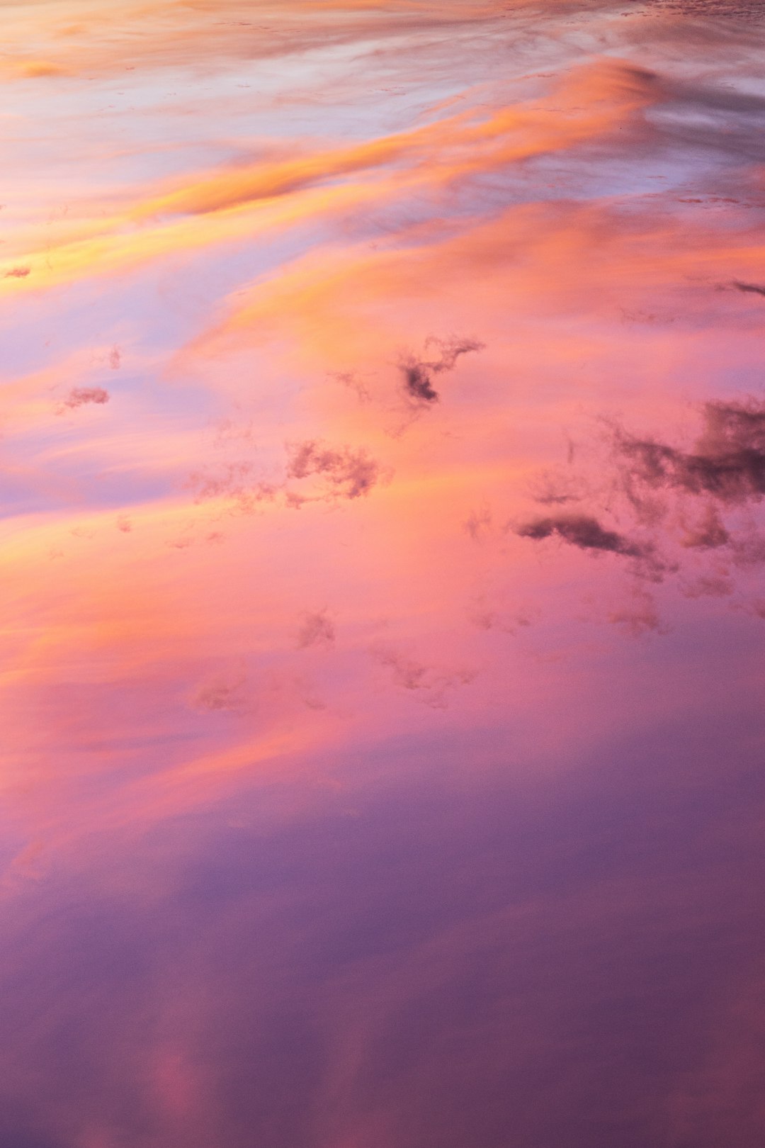 blue and white clouds painting