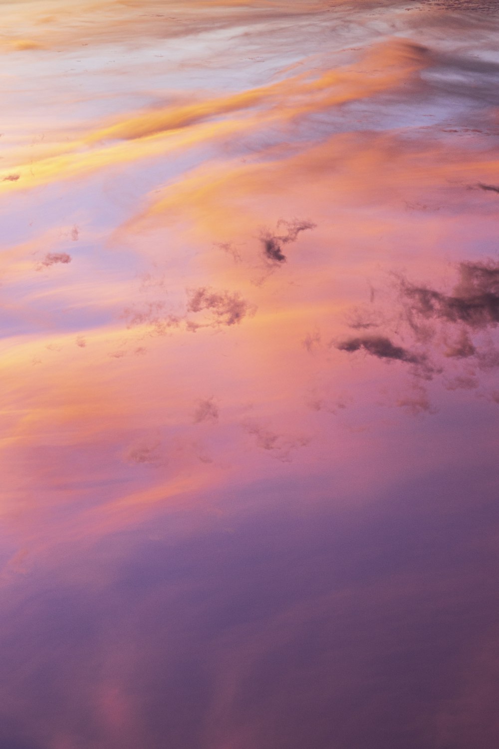 blue and white clouds painting