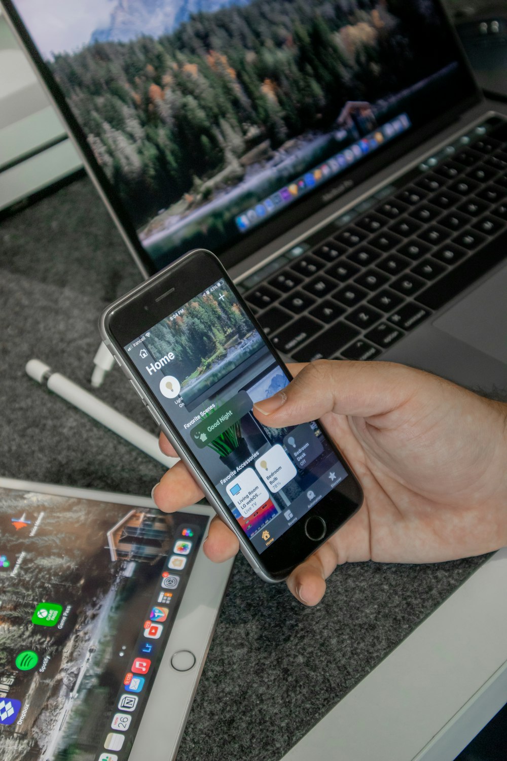 person holding silver iphone 6