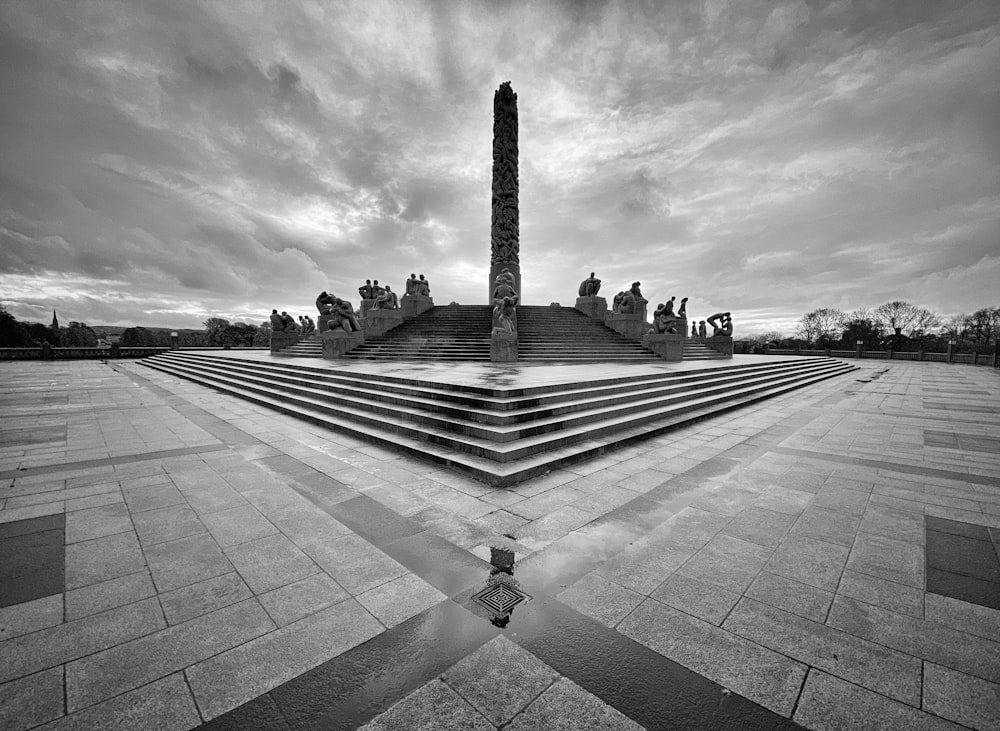 grayscale photo of cross monument