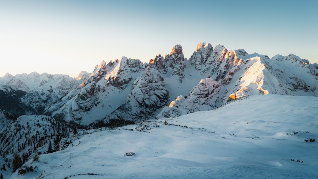 snow covered mountain during daytime