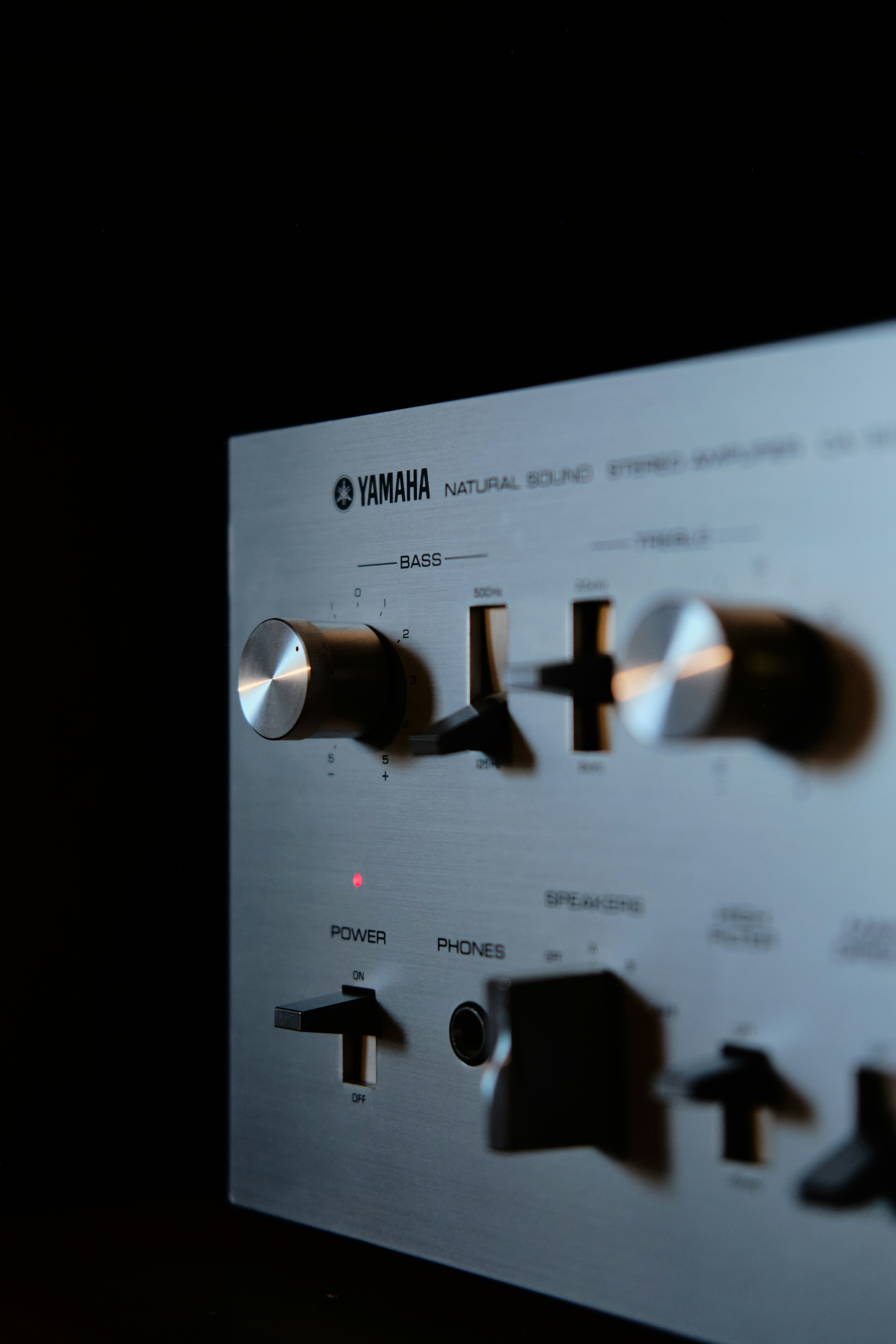 a silver and black audio mixer