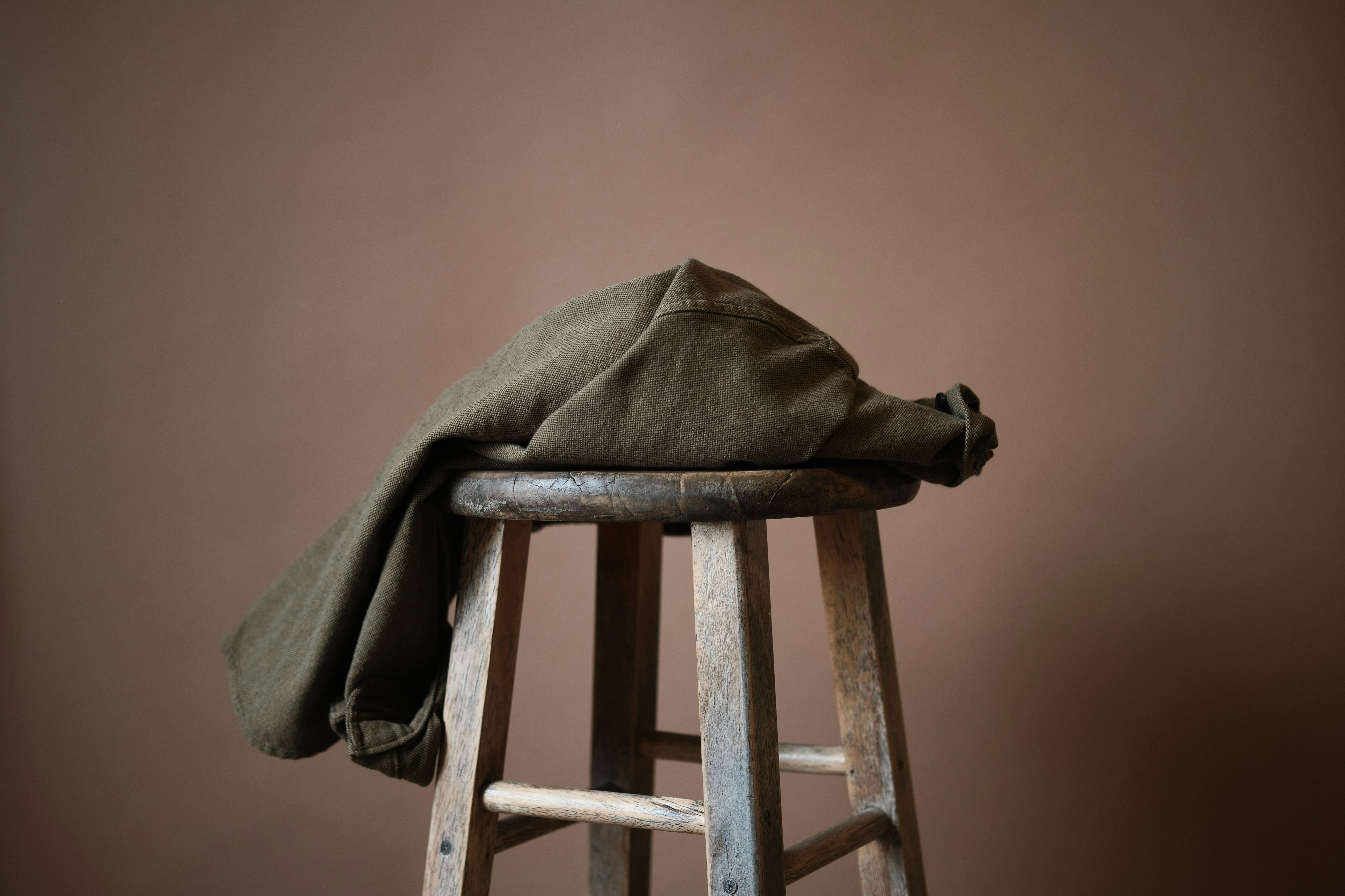 gray textile on brown wooden seat bar mitzvah teams background