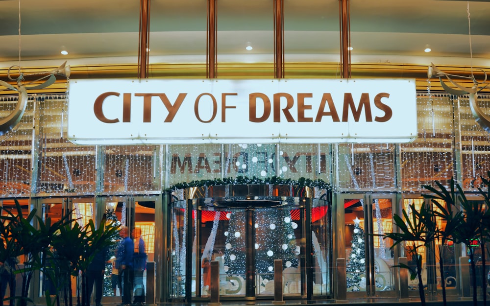 a city of dreams store with a sign above it