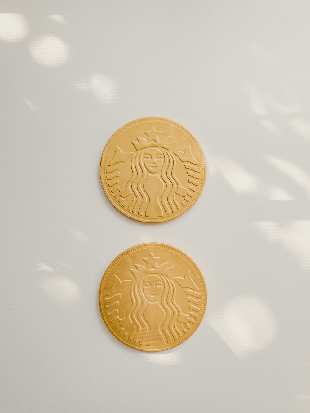 two round gold colored coins