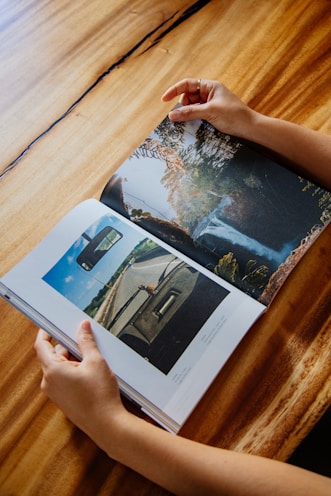 person holding white printer paper