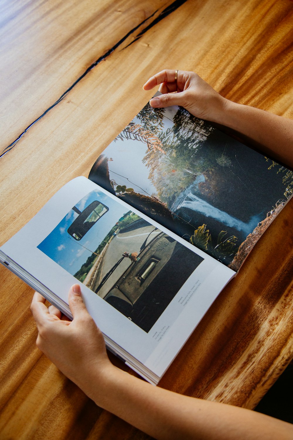 person holding white printer paper