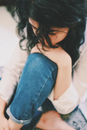 woman in blue denim jeans