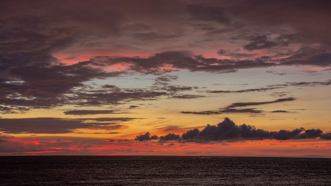 body of water under cloudy sky during daytime, Sunset on the Pacific