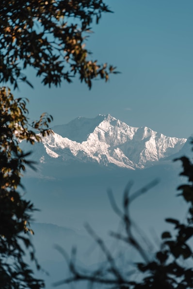 snow covered mountain during daytime