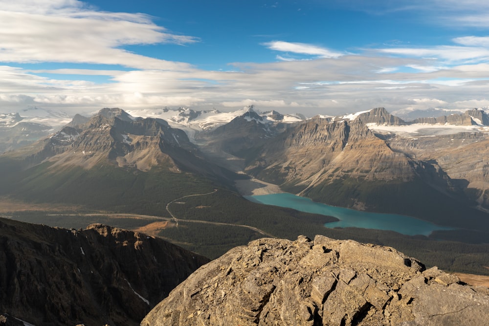 aerial view of lake and mountains during daytime