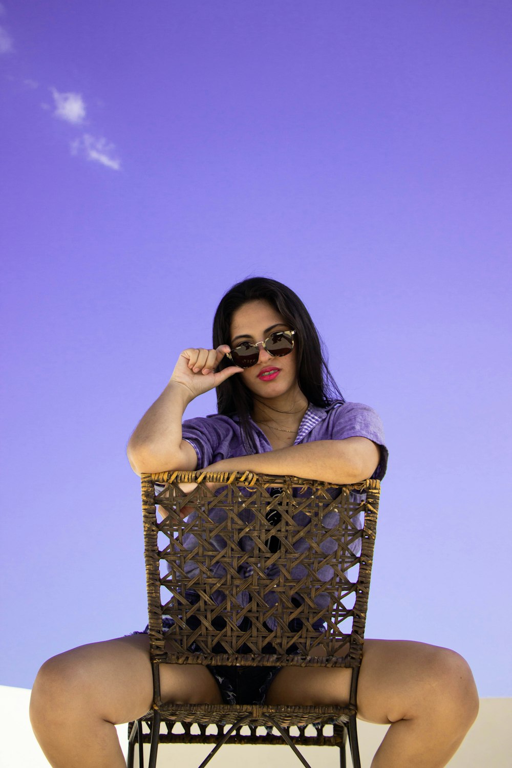 woman in black framed eyeglasses and gray shirt