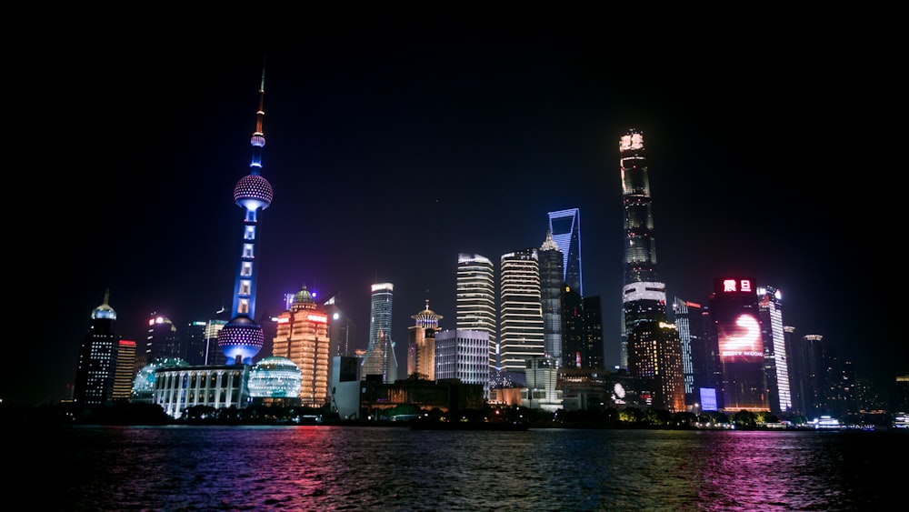 city skyline during night time