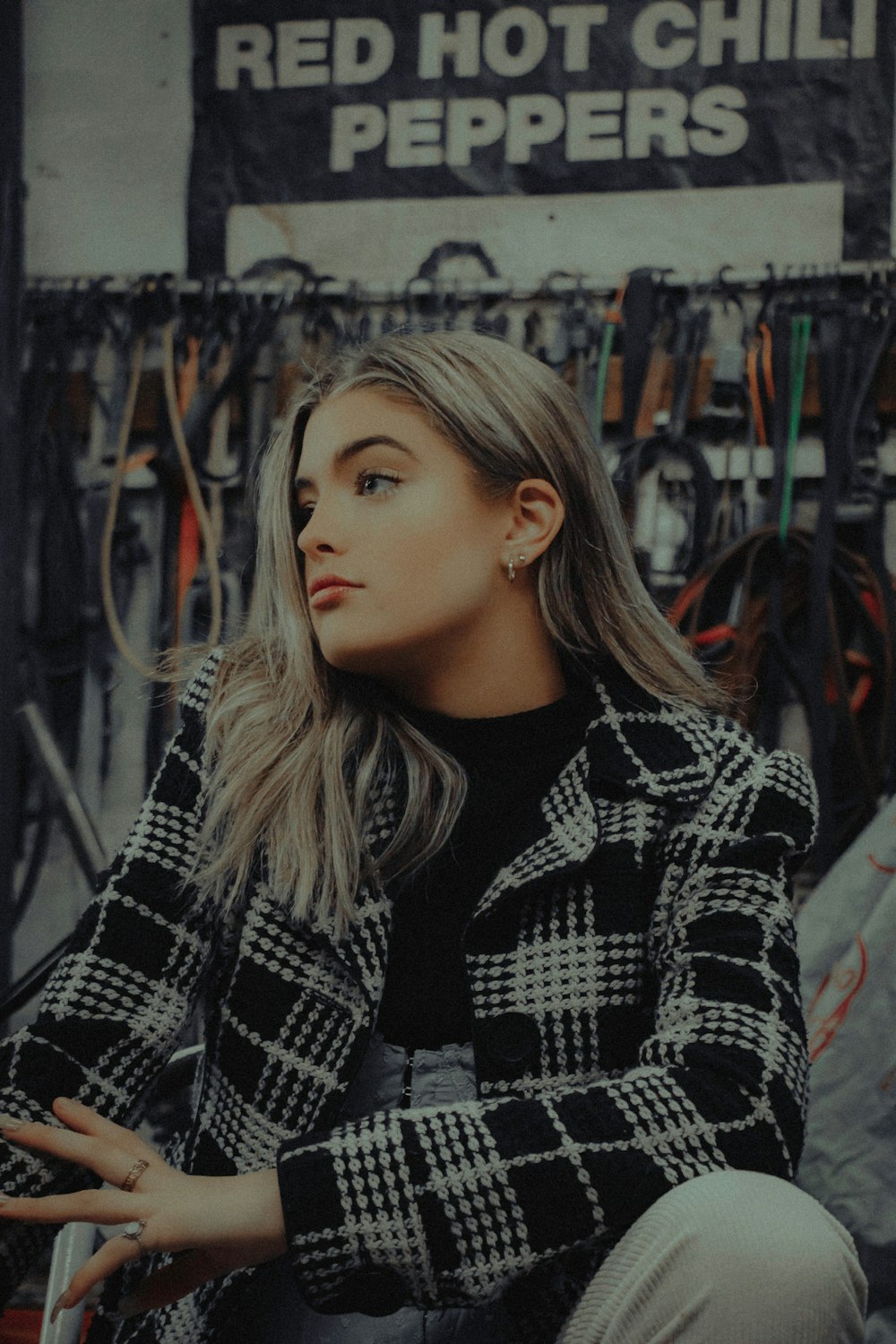 woman in black and white checkered long sleeve shirt