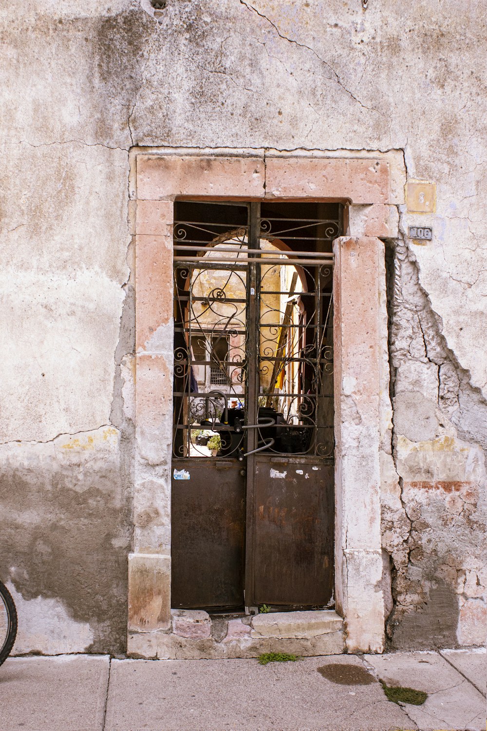 brown wooden door with brown metal door