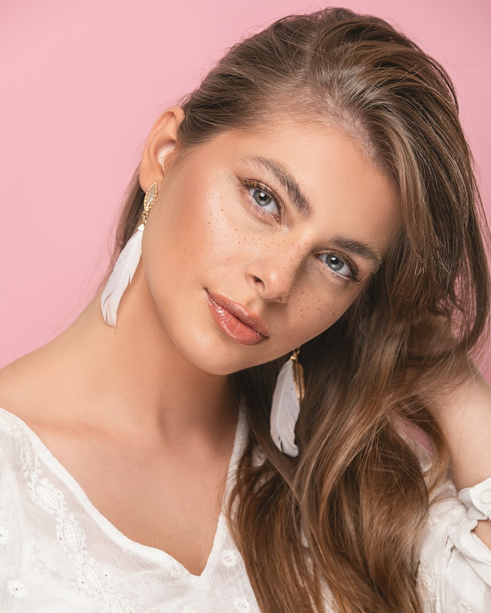 woman in white floral lace top