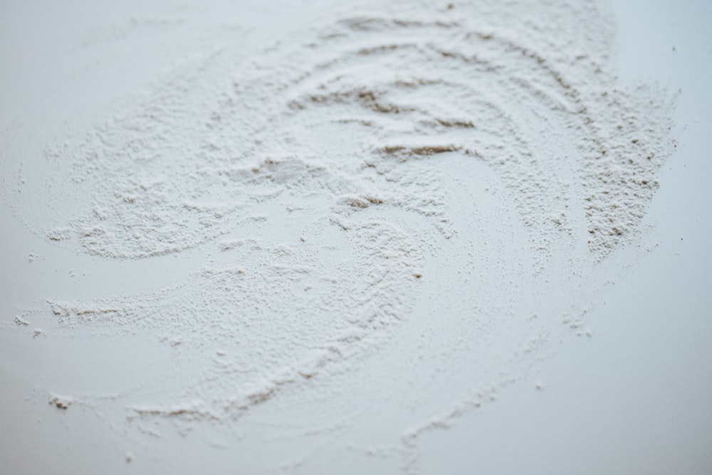 white snow on brown soil