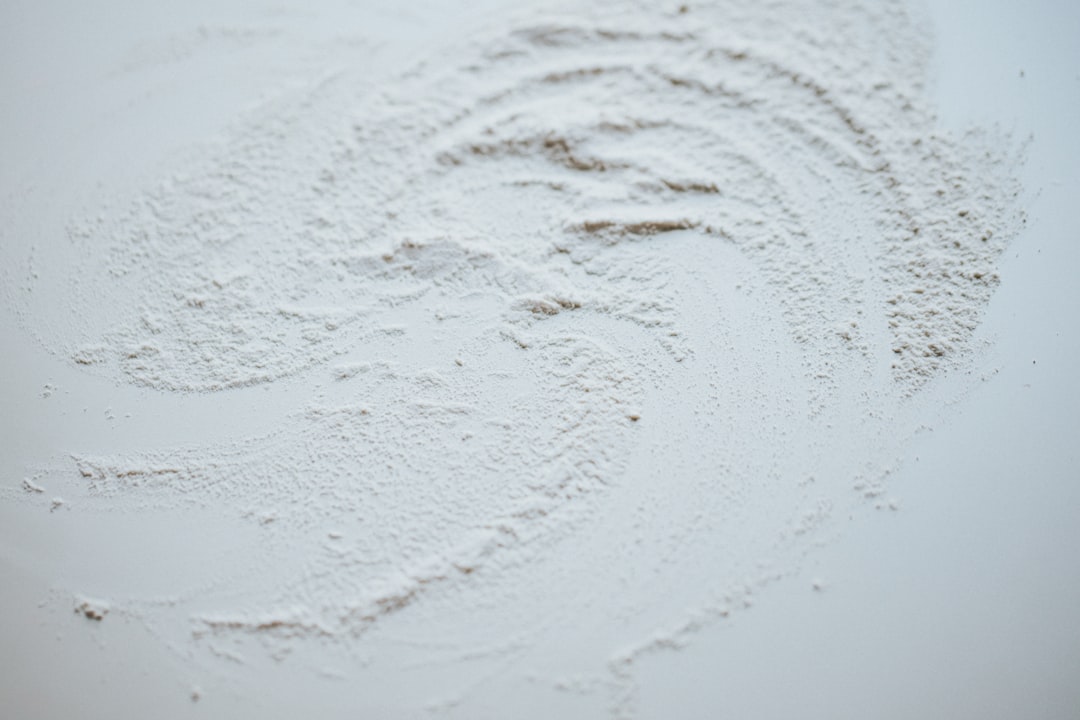 white snow on brown soil,