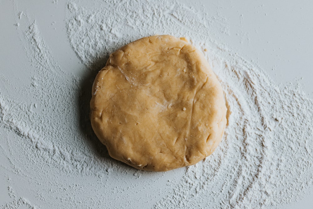 brown bread on white textile