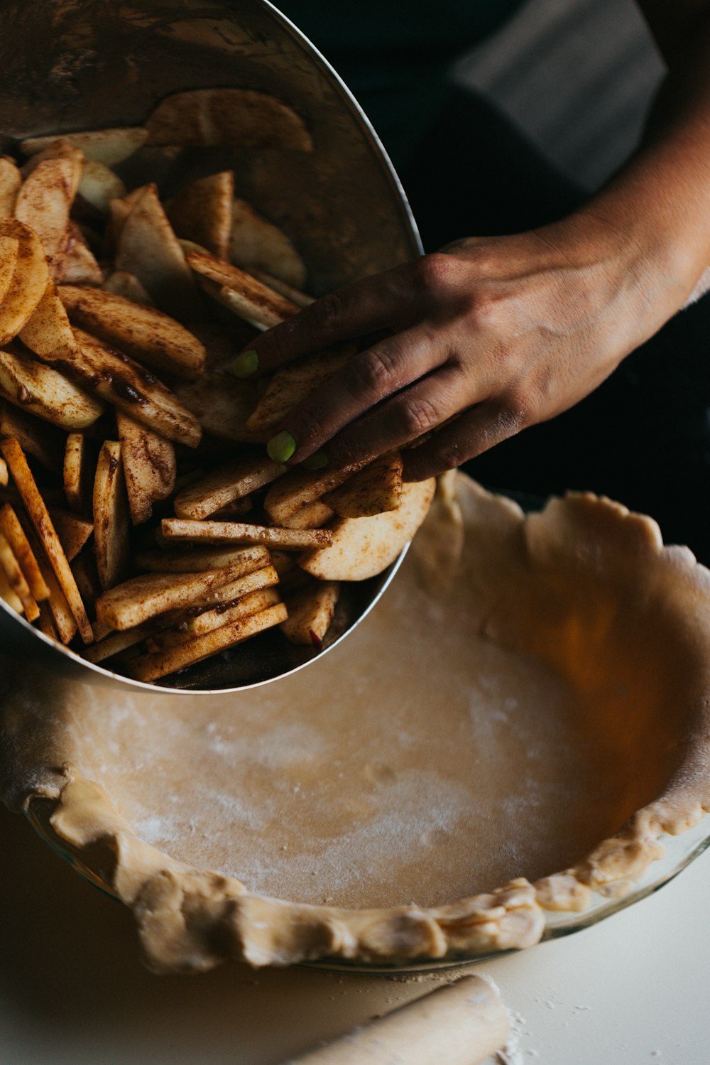 person holding brown fried food