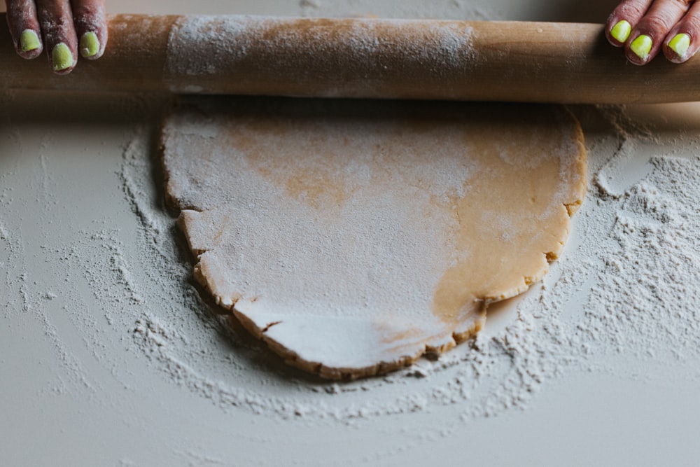 brown wooden stick on white surface