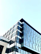 gray concrete building under white sky during daytime