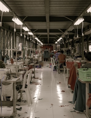 red and white dining tables and chairs in a t-shirt factory