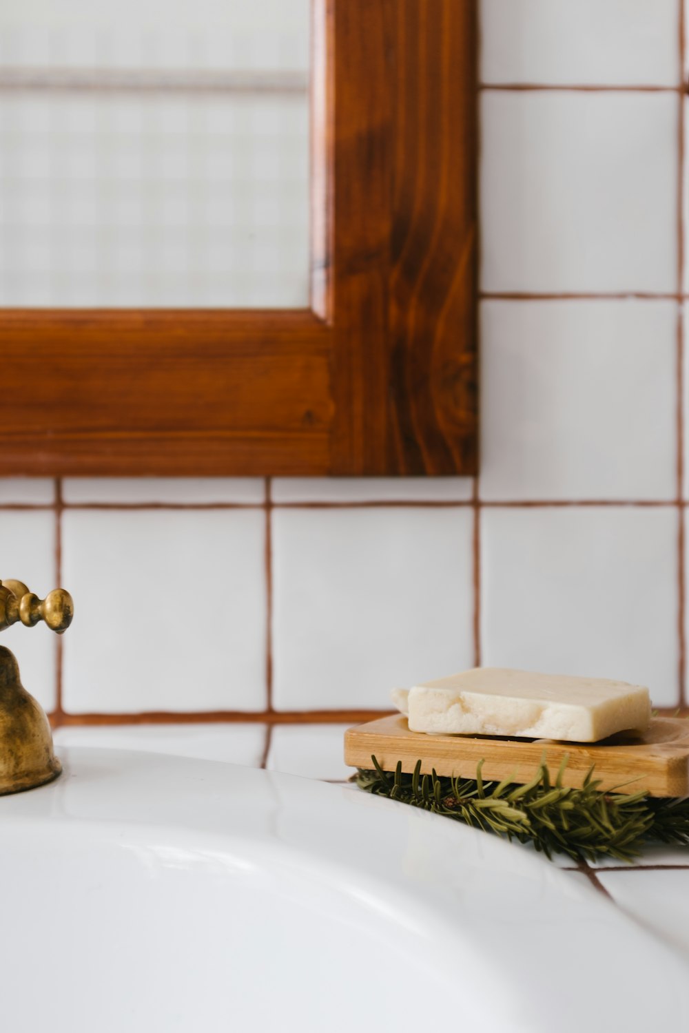 brown wooden chopping board on white table