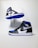 blue and black nike high top sneakers