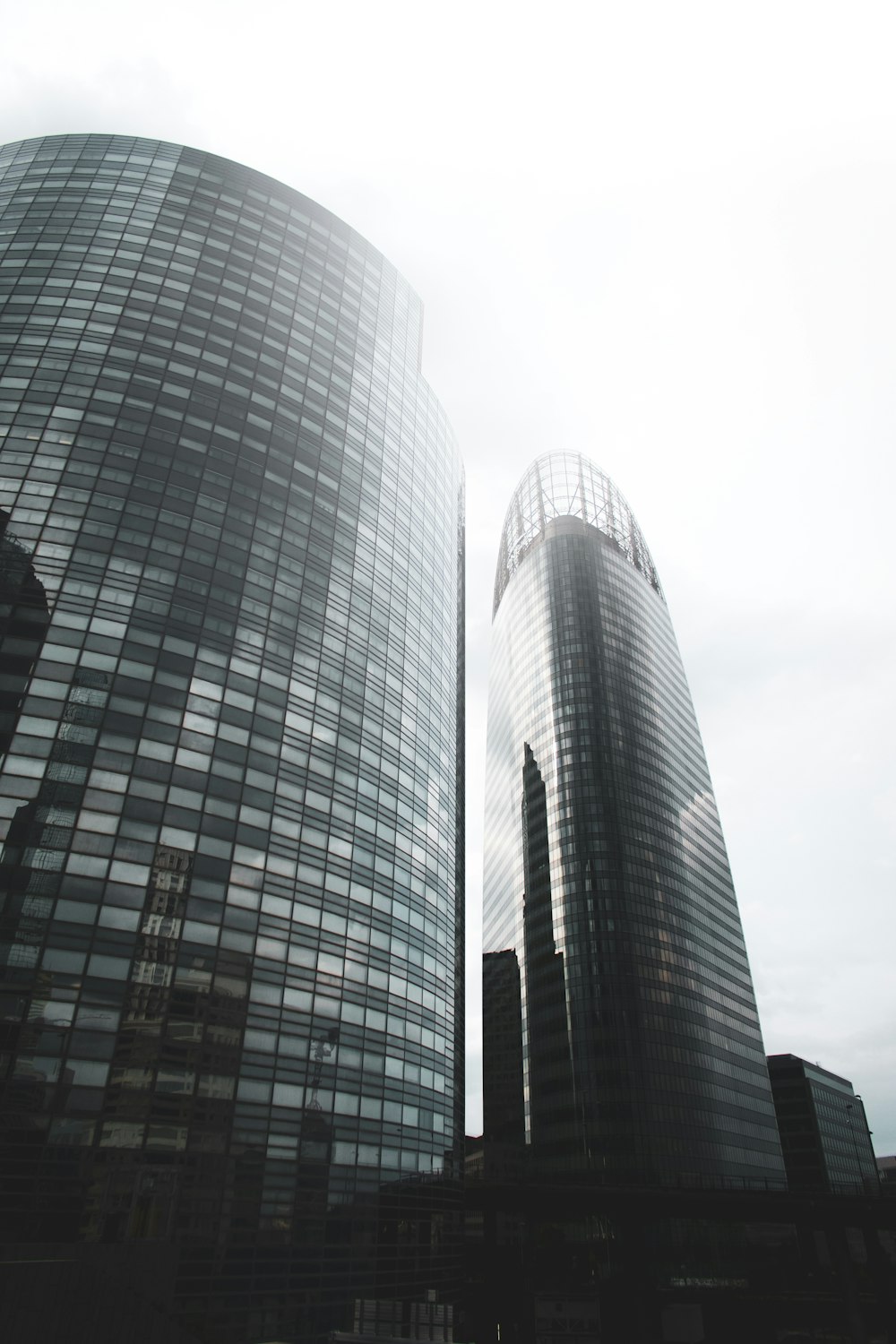 gray high rise building under white sky during daytime