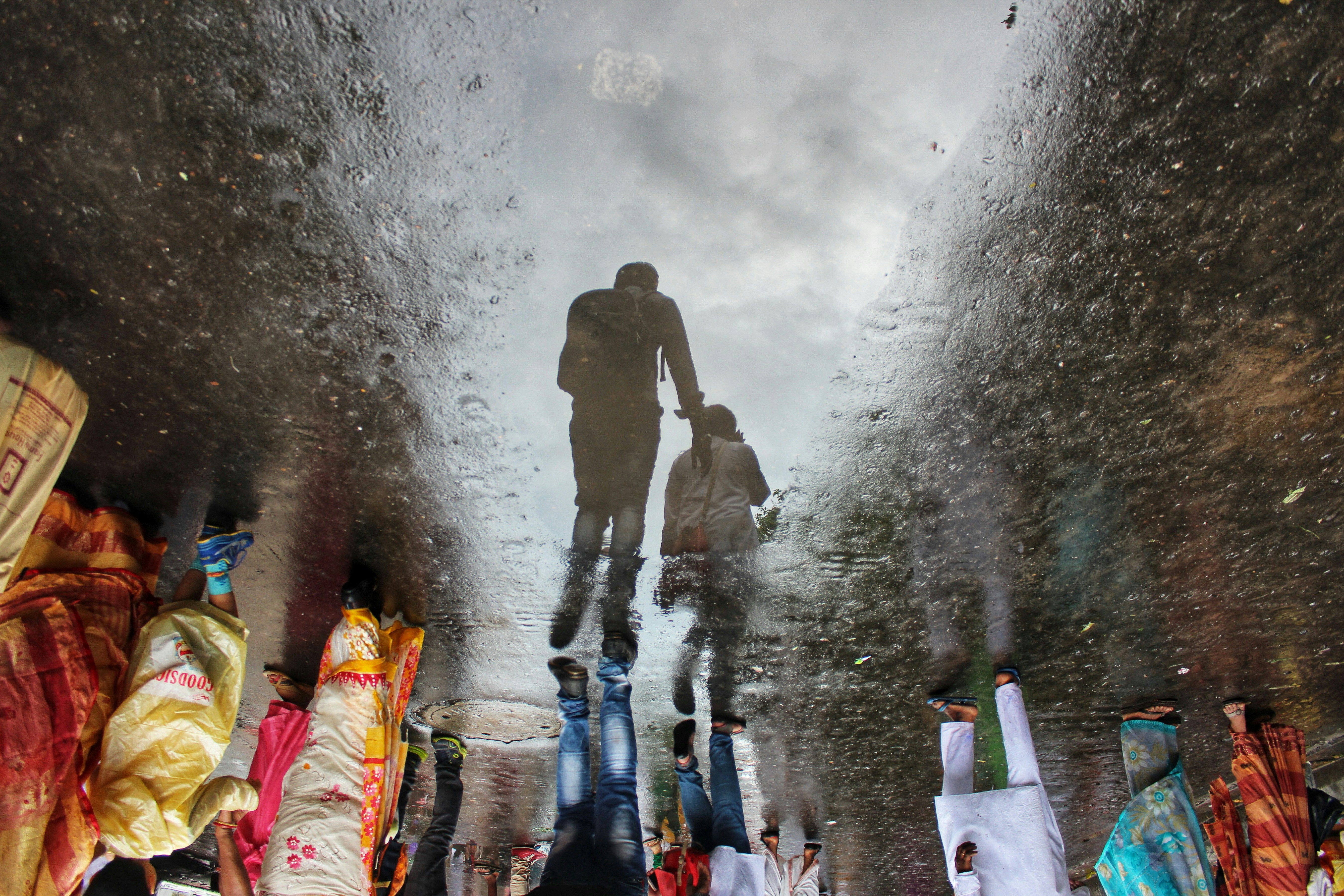 people in the middle of a foggy forest