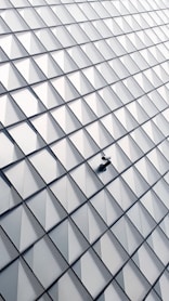 white and black glass walled building