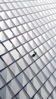 white and black glass walled building